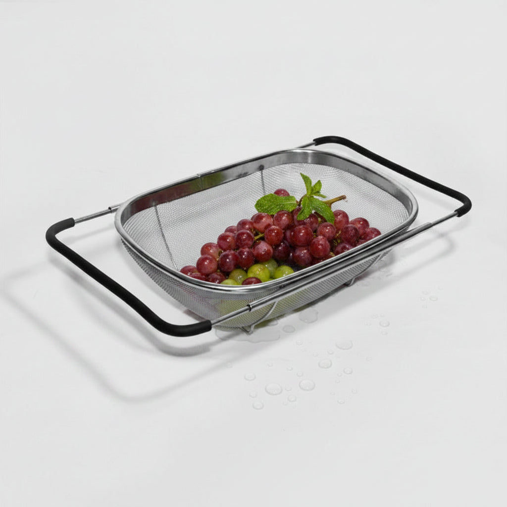 Metal mesh strainer with black frame on a white background