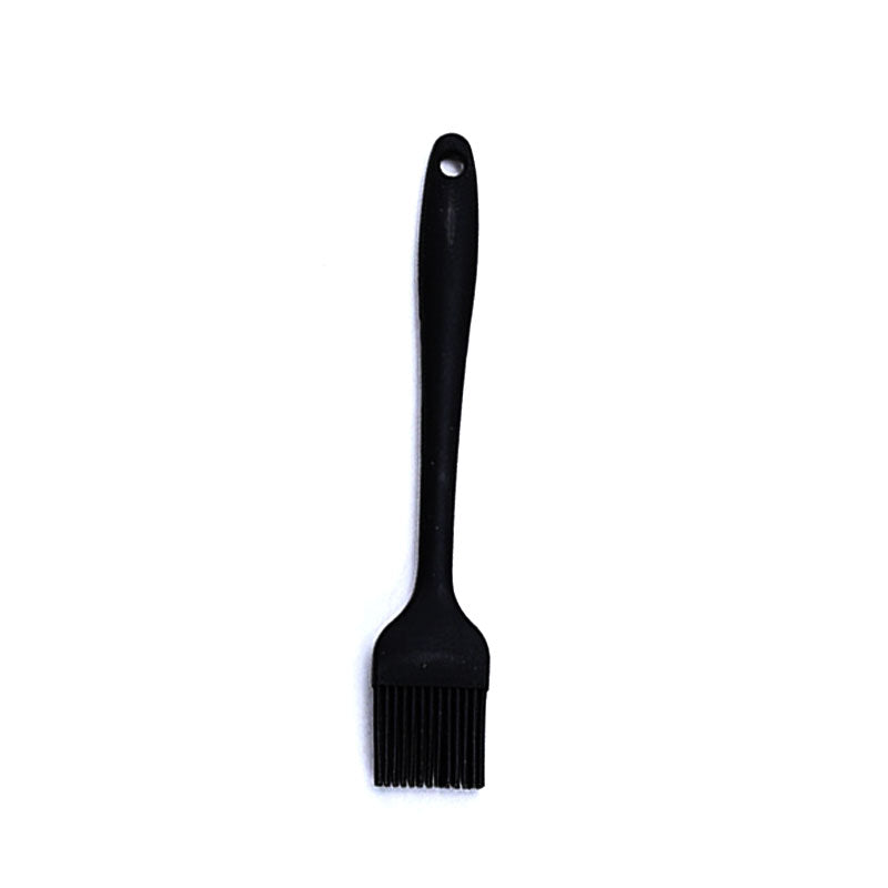 A black silicone basting brush with a long handle and a hanging hole, shown vertically on a plain white background.