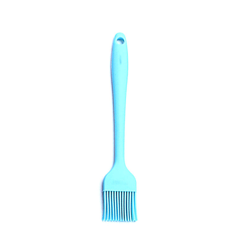 Blue barbecue brush on a white background