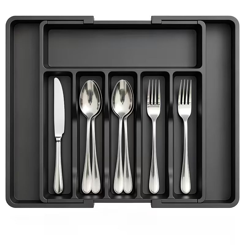 A black plastic cutlery organizer tray holding six pieces of polished silver stainless steel flatware, including a knife, two spoons, a fork, and another fork, shown on a plain white background.