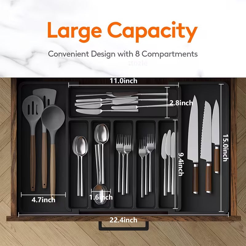 A large capacity cutlery organizer set shown in an open wooden drawer, with dimension labels for the compartments and utensils. The set includes stainless steel cutlery and utensils with brown handles, arranged in black organizer trays.